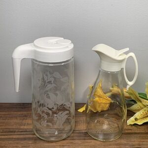 2 ~ Vtg Syrup Pitcher 70s Eagle + Tang Pitcher Etched Floral Pop Top 80s Clear